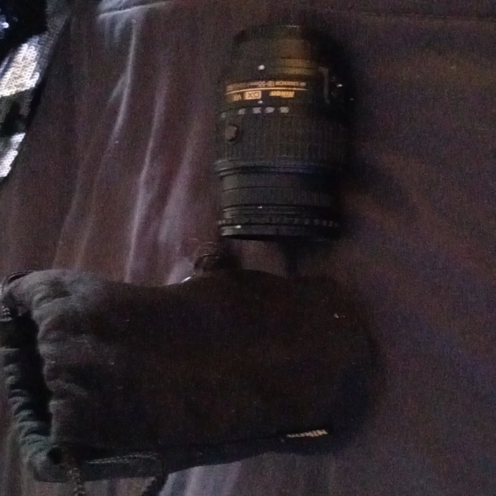Nikon D3100 sigma lense, black. Comes with Nikon black bag.